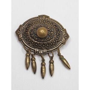 Vintage brass dangle brooch ethnic style oval pin with bullet drops 1950s